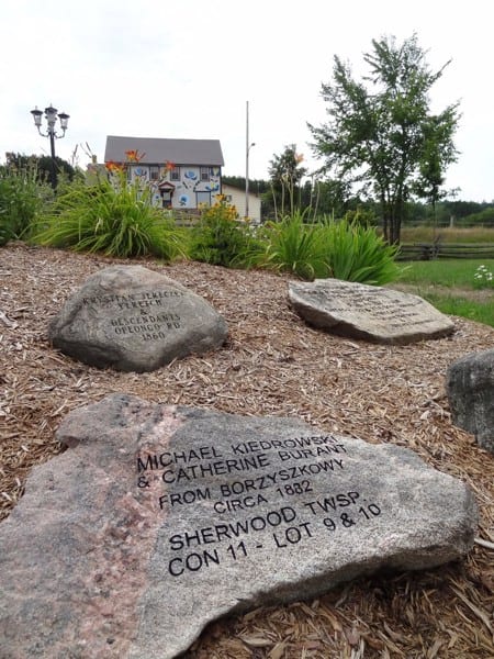 markers on the grounds of the wilno heritage park celebrate the history of the region's founding families. photo by laura byrne paquet.