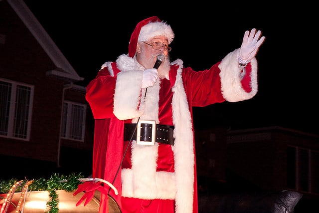 santa waving from a float at a santa claus parade ottawa