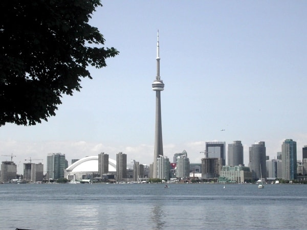 there are many ways to get from ottawa to toronto to enjoy this view of the cn tower and the rest of the skyline.