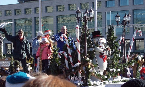 float with people, candy cane and snowman in front of Ottawa City Hall