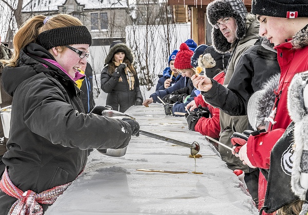 winter festivals: maple taffy on snow at quebec carnaval.