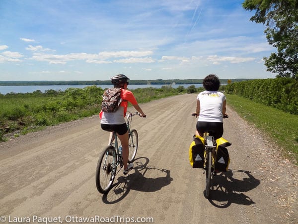 cycling on a country road near aylmer, quebec, with escape bicycle tours.