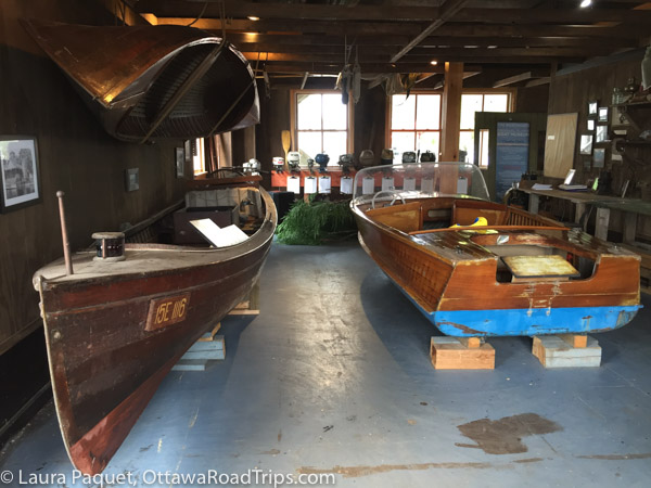 antique skiff and motorboat in gananoque museum.