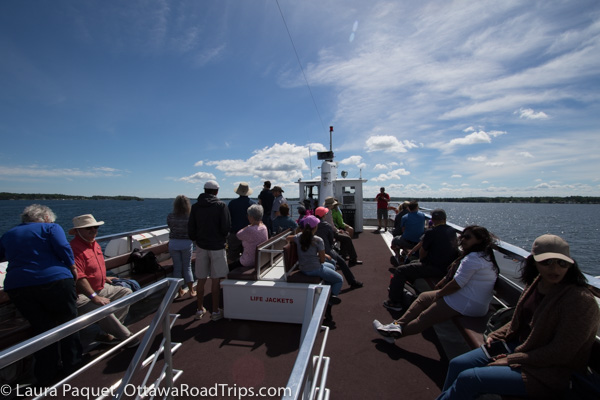 passengers on the deck of a gananoque boat line boat.