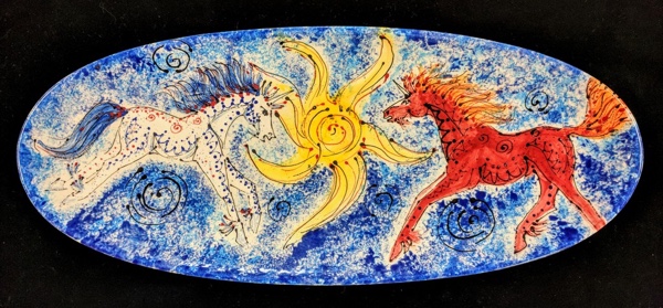 Spirit Horses: Come Together, an oval ceramic platter by Katharine Fletcher, is one of many works by local artists available at the La Fab boutique. Photo courtesy of Katharine Fletcher.