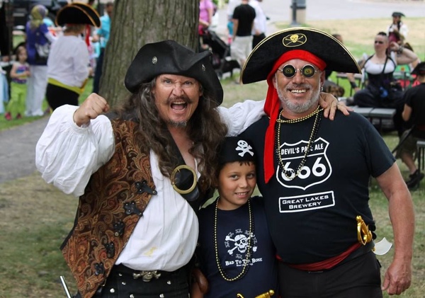 Two men and a boy in pirate costume at Pirate Invasion in Gananoque.