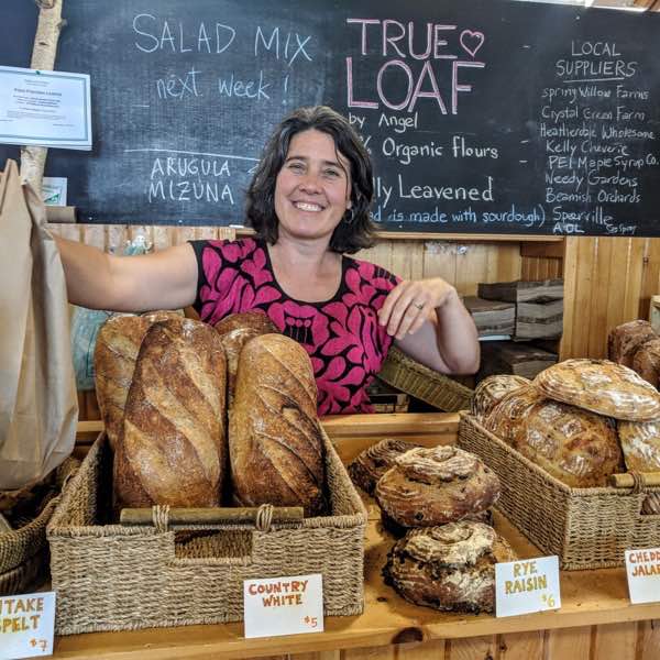 True Loaf's baker, Angel, at the Farmers' Market, Charlottetown. Photo by Katharine Fletcher.