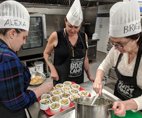 Culinary Boot Camp at the Culinary Institute of Canada: Here's my team, cooking up a storm. Photo by Katharine Fletcher.