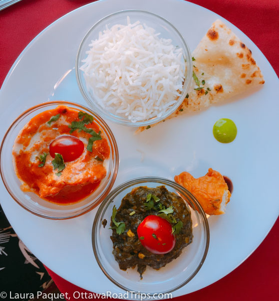 Tasty Indian dishes, including saag paneer and butter chicken, at Sagar Indian Cuisine in Carleton Place, part of the Bites on Bridge Street Good Food Tour.
