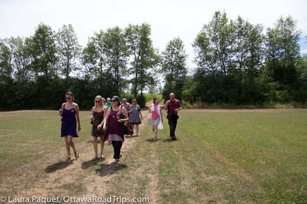 The tour group leaves the vineyard at Smokie Ridge Vineyard.