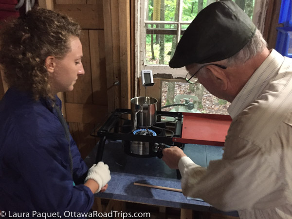 Making maple syrup in the 1910-style sugar shack at the Deakins on Mountainview B&B.