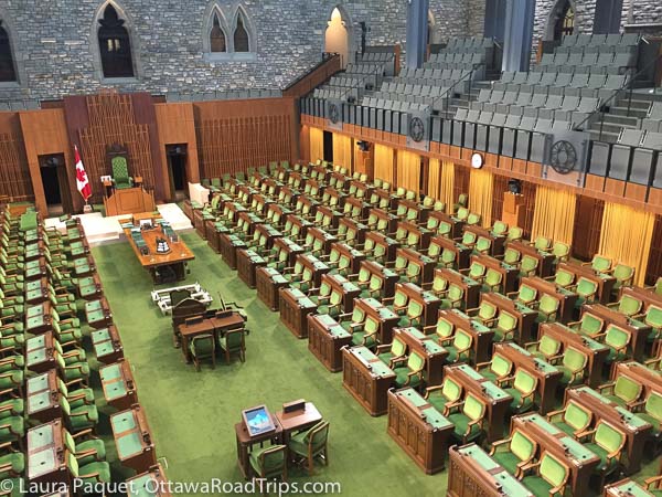 the house of commons chamber in the west block on parliament hill in ottawa, ontario.
