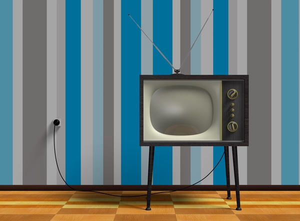 Vintage TV against a blue, grey and white striped background.