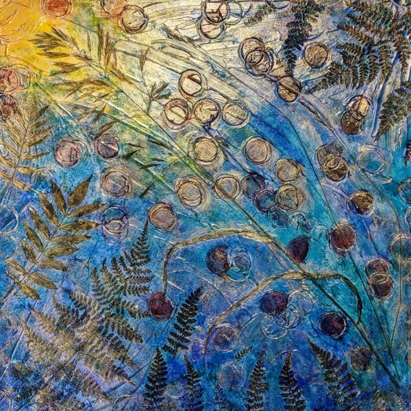 Mixed media work of meadow flowers in shades of gold, blue and purple.