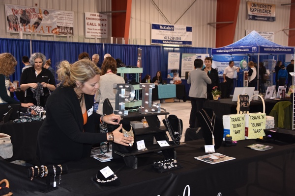 Vendor booths and shoppers at the Kemptville Shop Local Showcase.