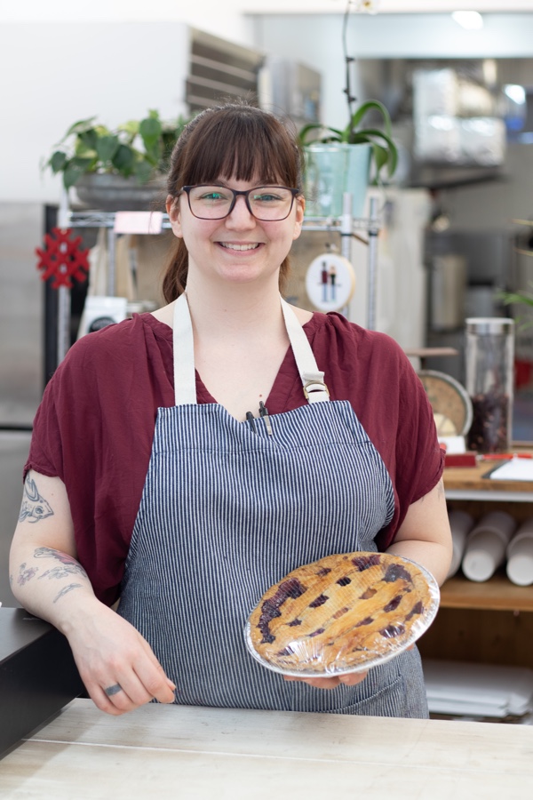 kassy boulay holding a pie.
