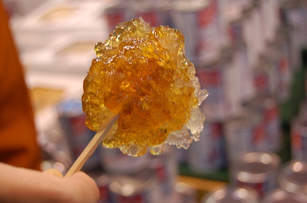 maple syrup candy (taffy) on a stick.
