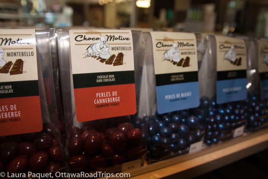 chocolate covered berries in bags on a shelf at chocomotive in montebello, quebec