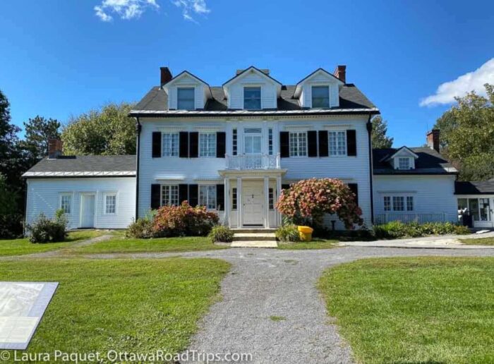 billings estate national historic site, large white house with black shutters and three dormers