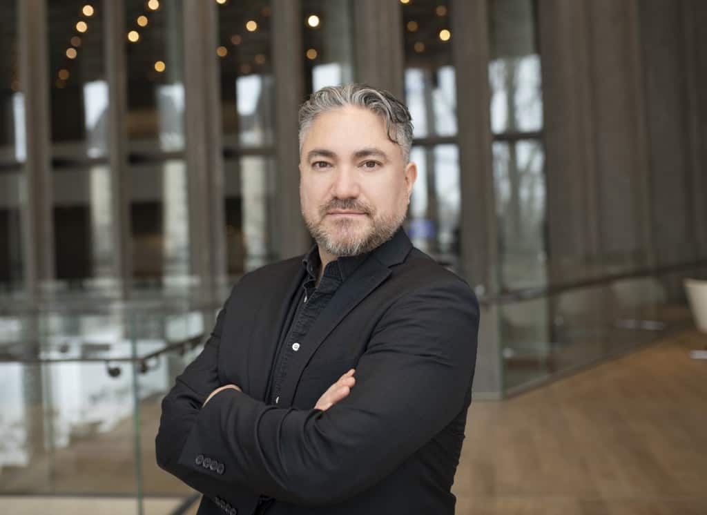 Kevin Loring, artistic director of the National Arts Centre Indigenous Theatre program, standing in the NAC lobby.