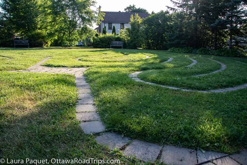 labyrinth path on a green lawn
