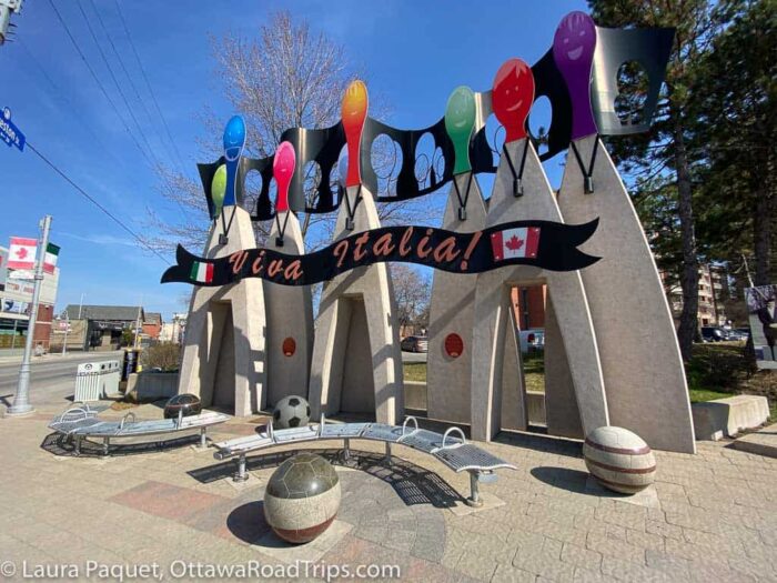 bowling pin sculpture with corso italia banner