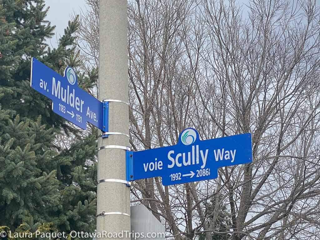 ottawa street signs showing intersection of mulder avenue and scully way in orleans.