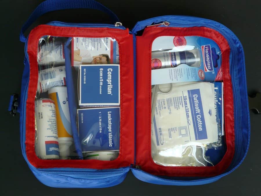 bringing a small first aid kit, like this one in a zippered pouch with clear plastic windows, is one of my top road trip tips. safety first!