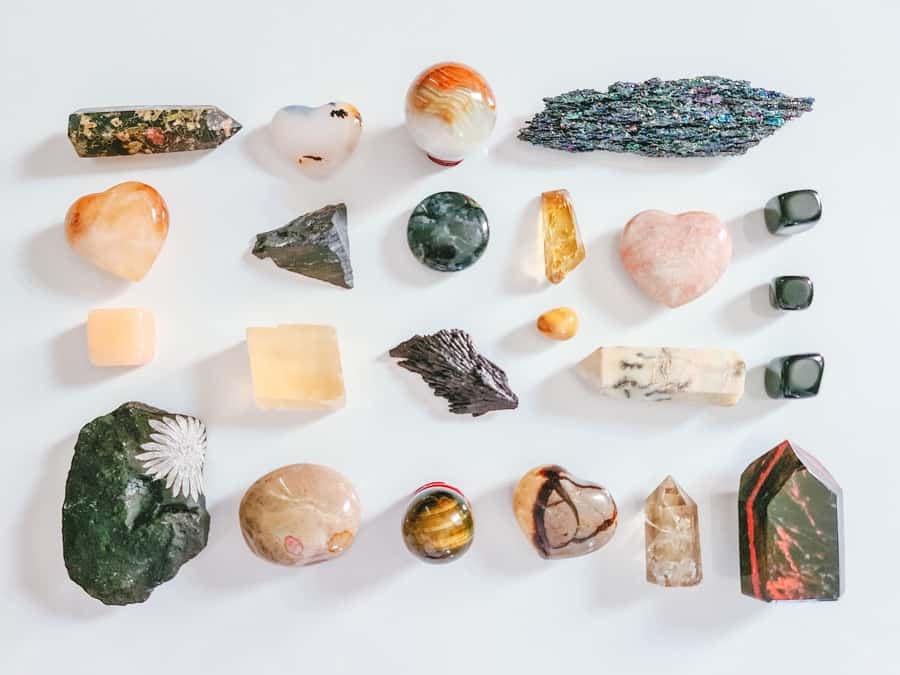 Various gemstones and minerals displayed on a plain white background.