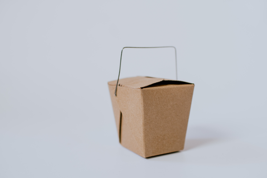 cardboard takeout container against a white background