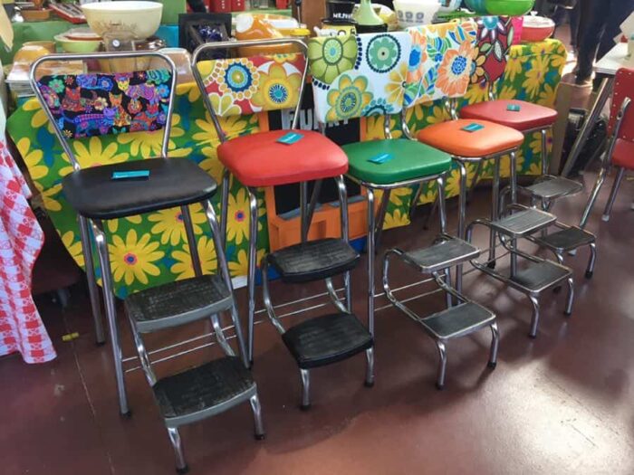 613flea-kitchen-chairs-small - Ottawa Road Trips stepstool-style 1960s kitchen chairs with psychedelic vinyl backs.