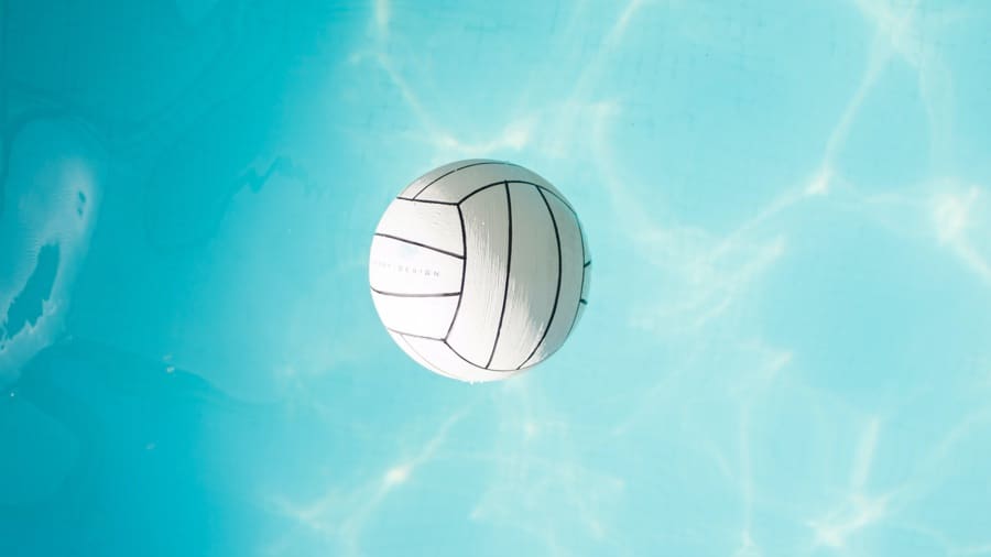 white volleyball against a blue sky