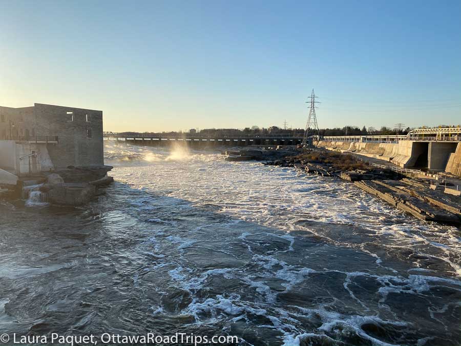chaudiere falls on the ottawa river, with industrial ruin in foreground.