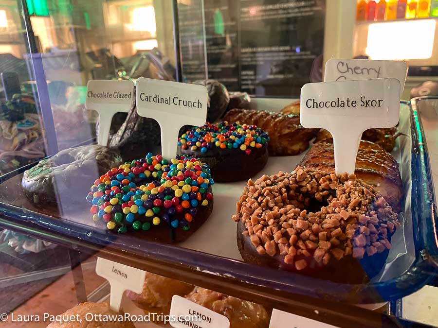 doughnuts in a display case at the cardinal cafe in sharbot lake