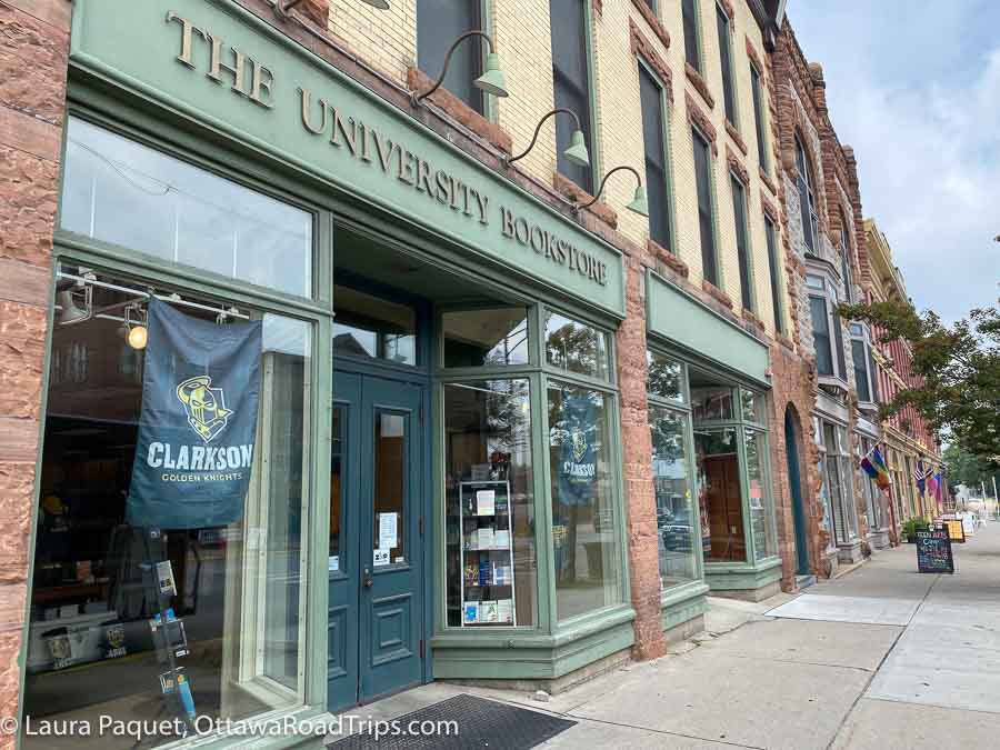 facade of the university bookstore in downtown potsdam, new york.