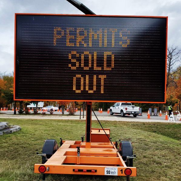 large illuminated sign reading permits sold out