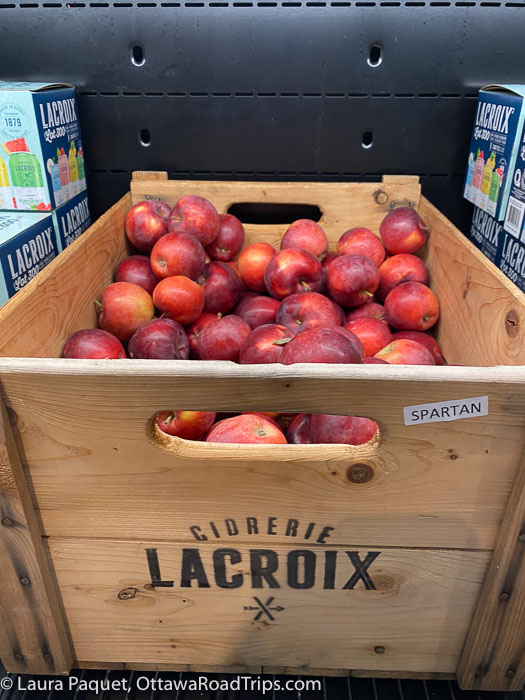 wooden crate filled with red spartan apples
