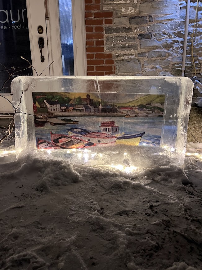 painting of boats in a small harbour, encased in ice and illuminated