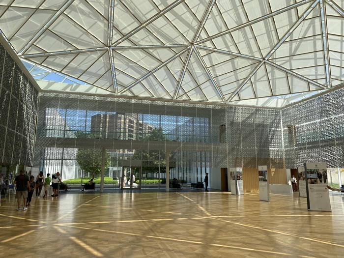 ismaili imamat sussex doors open - Ottawa Road Trips large atrium with parquet floor and white shades on ceiling glass