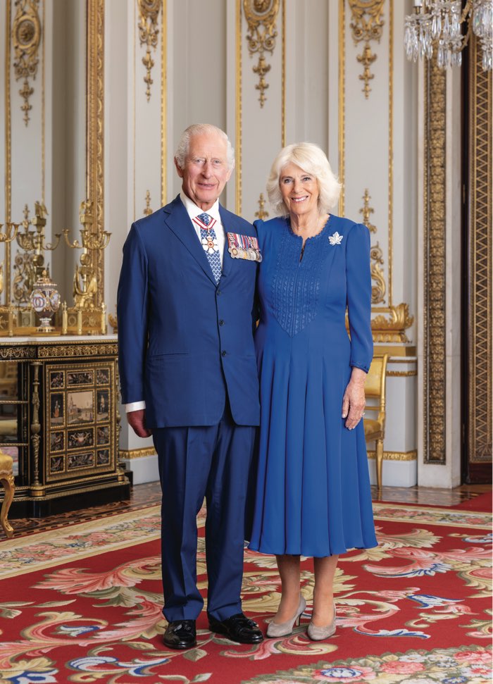 king charles queen-official-millie pilkington - Ottawa Road Trips king charles iii and queen camilla in blue clothes in a gilded room.