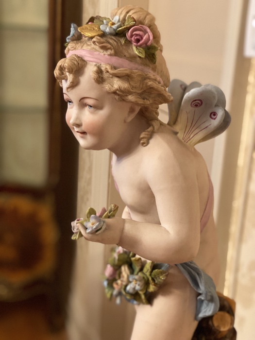 closeup of a decorative plaster cherub