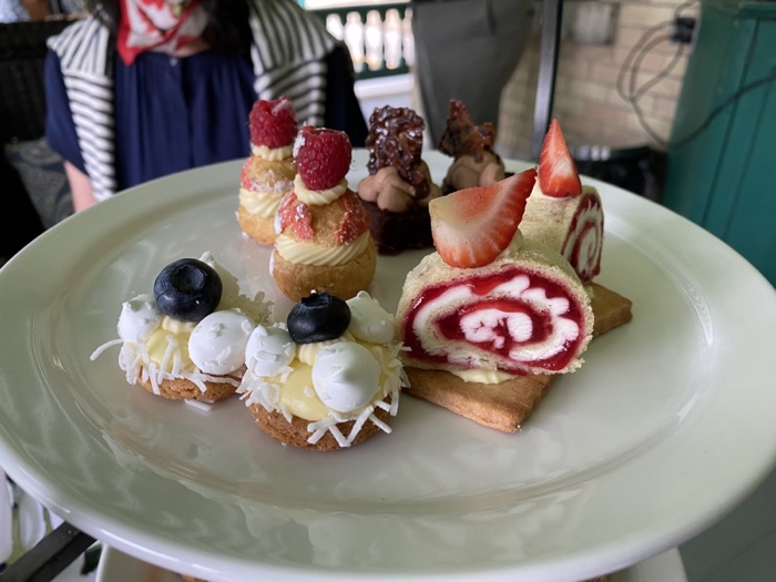 various small desserts on a white plate