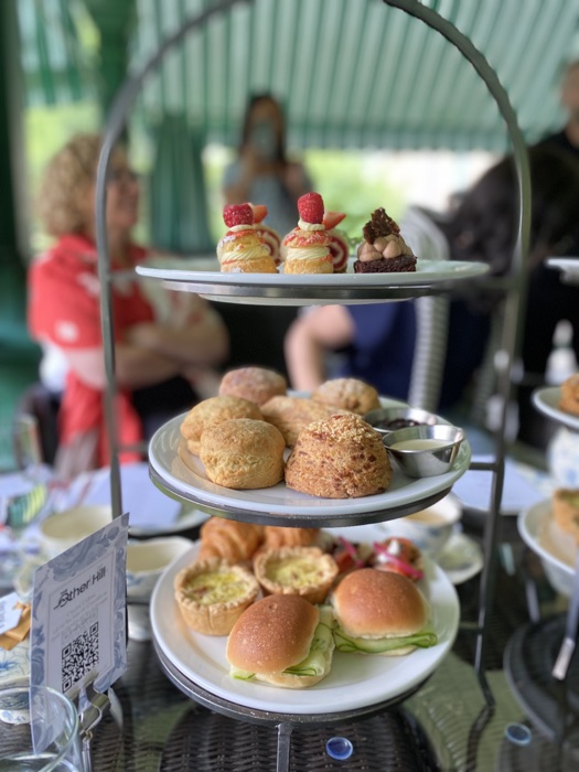 three-tiered tray with sandwiches, scones and petit fours at laurier house national historic site
