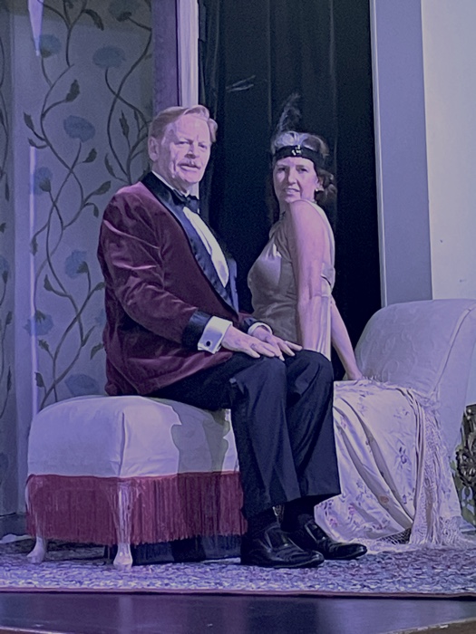 hay fever photo sized - Ottawa Road Trips man and woman in 1920s formal wear, sitting on a chaise longue