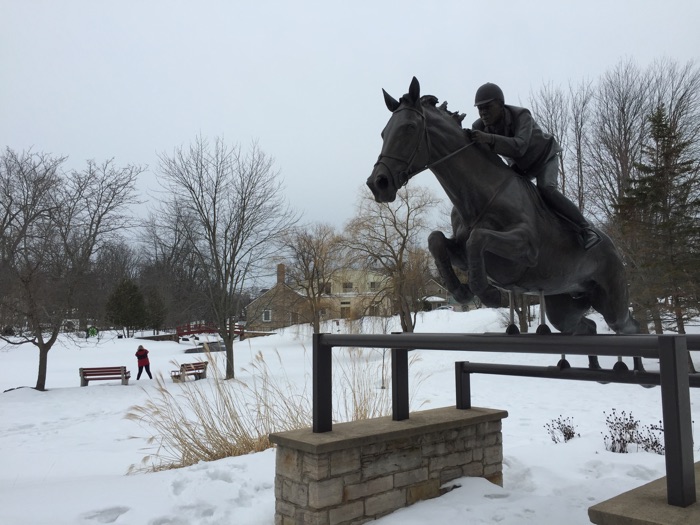 perth stewart park big ben winter - Ottawa Road Trips sculpture of equestrian ian millar with snowy stewart park in background