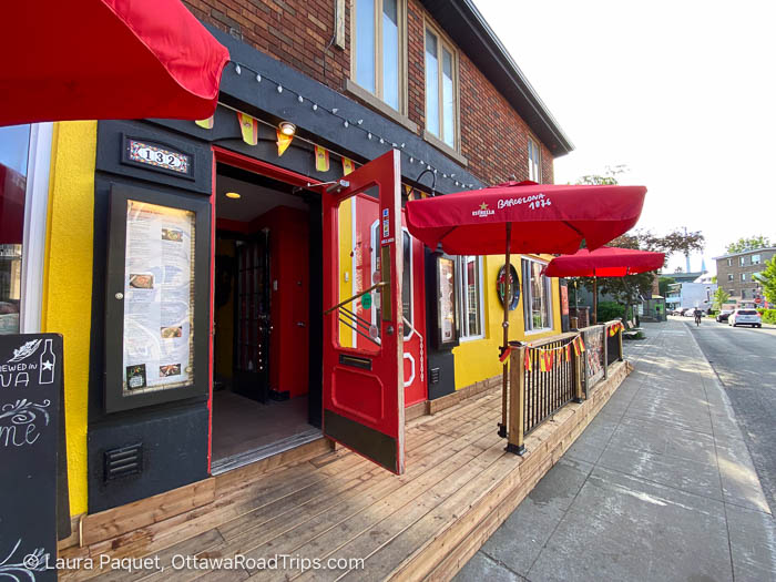 red-and-yellow facade of ole tapas restaurant in sainte-anne-de-bellevue
