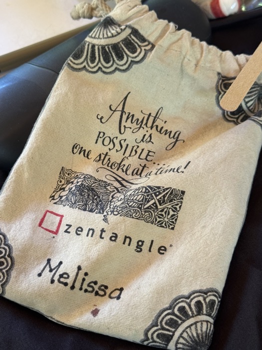 fabric bag with the slogan "anything is possible ... one stroke at a time! zentangle"