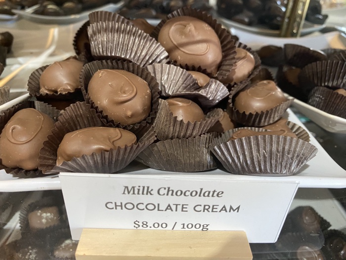 chocolates village treats lanark - Ottawa Road Trips milk chocolates on a white plate in a display case