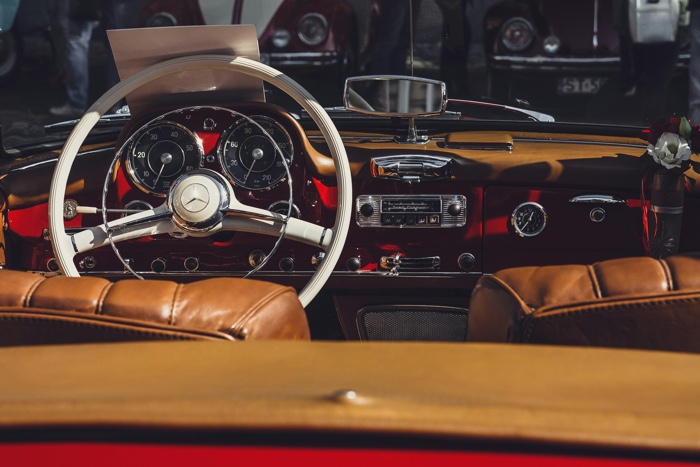 dashboard of a classic car with interior leather upholstery