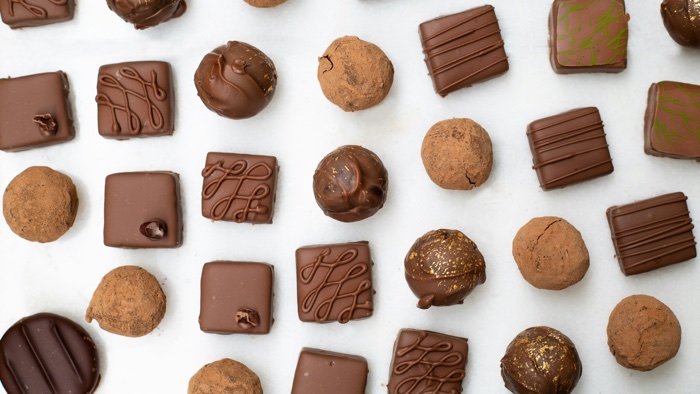 jessica-loaiza-chocolate-unsplash - Ottawa Road Trips a variety of chocolate candies and truffles, photographed from above